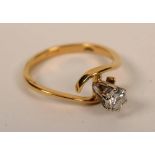 An 18ct gold solitaire diamond ring, the central brilliant cut diamond,
