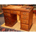 A mahogany kneehole desk,