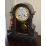 A late Victorian black slate mantle clock by Hamilton & Inches of Edinburgh,