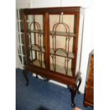 A Chippendale style mahogany display cabinet,