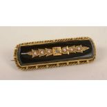 A 15ct gold diamond and pearl mourning brooch,