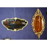 Two Victorian style gilt wall mirrors, with scroll decoration,