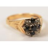 A 9ct gold sapphire and diamond flowerhead ring,