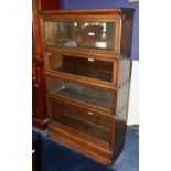 A Globe Wernicke oak stacking bookcase, with four glazed sections, raised on bombe style base, 145cm