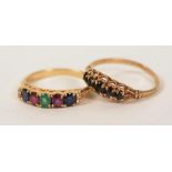 A 14ct gold multicolour five stone ring, set with central emerald flanked by two rubies,