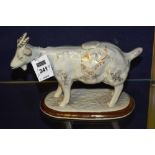 A 19th century Staffordshire cow creamer with cover,