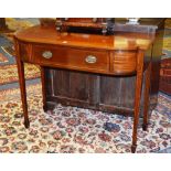 A Georgian style mahogany inlaid side table, with shaped top above central drawer,