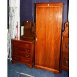 A vintage mahogany hall wardrobe with single panelled door, raised on plinth base, 178cm high,