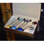 A set of six George V silver and enamelled coffee spoons, Birmingham 1928 by William Socking Ltd,
