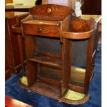 An Arts & Crafts oak stick stand, with hinged compartment, flanked by an open recess,