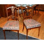 Two Edwardian rosewood parlour chairs, with satinwood swag and urn inlay, 88cm high,