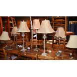 A quantity of modern table lamps, with shades,