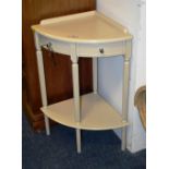 A small painted corner table, with dummy drawers above undertier, 80cm high x 57.