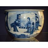 A Chinese blue and white pottery jardiniere, of circular form, decorated with figures in foliage,