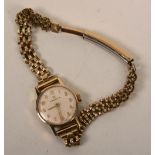 A yellow metal lady's Omega wristwatch,