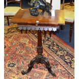 A Victorian tripod table, with converted square shaped top,