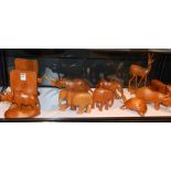 A quantity of African wooden animal ornaments, to include rhino and rhino bookends, turtle,