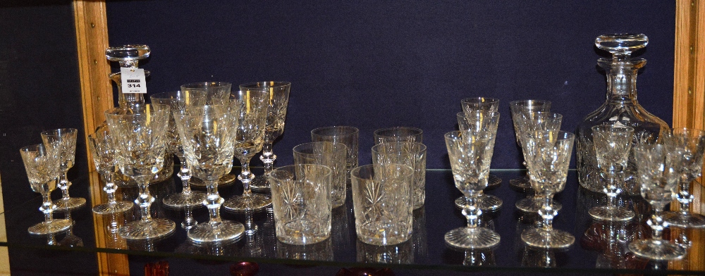 A suite of Edinburgh crystal, comprising of a pair of mallet shaped decanters with stoppers,
