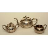 A late 19th/early 20th century Chinese export three piece silver teaset, by Wang Hing & Co, Hong