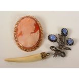 A 9ct gold cameo brooch, the oval cameo carved with female bust, together with a silver,