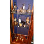 A quantity of sundry collectables, to include etched glass decanters, bronze effect figures,