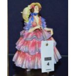 A Royal Doulton statuette of The Hinged Parasol, HN1579, 17cm high CONDITION REPORT: Lot 4 - chip to