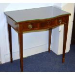 A mahogany serpentine side table, with single drawer raised on tapering supports and spade feet,