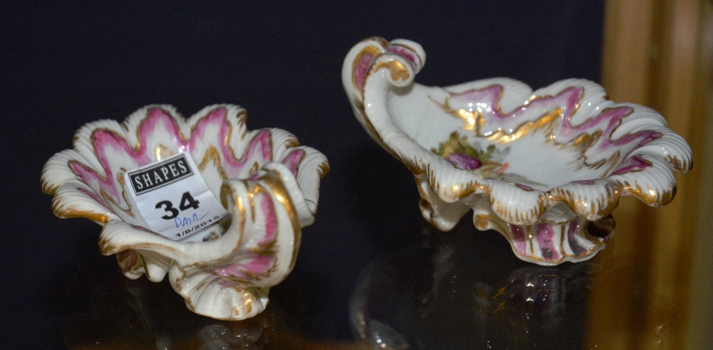 A pair of 19th century Meissen porcelain salt dishes, of scalloped form,