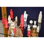 A quantity of Cantonese ivory chess pieces, in the form of holy and regal figures,