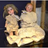 Two Armand Marseilles bisque headed dolls, first doll stamped 'AM Germany 351/2 1/2K',