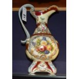 A Vienna style ceramic toilet ewer, decorated with foliate panels within a cream ground,