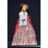 A Royal Doulton statuette of a Victorian lady, HN727, 20cm high CONDITION REPORT: Lot 2 - repaired