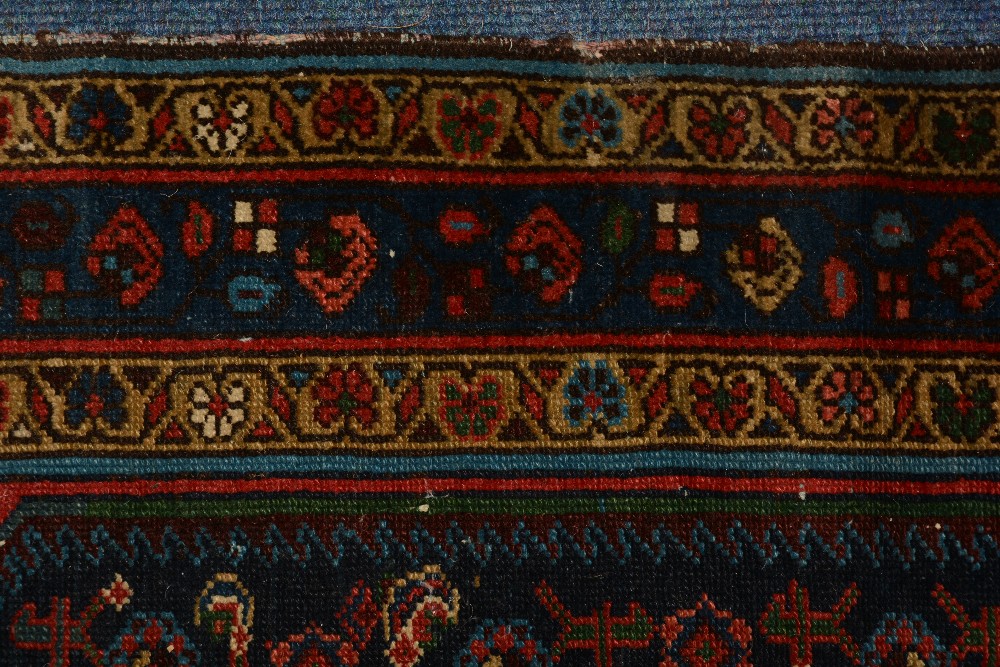 An antique Persian Malayer rug, the central rosette over blue foliate ground, with spandrels and - Image 3 of 5