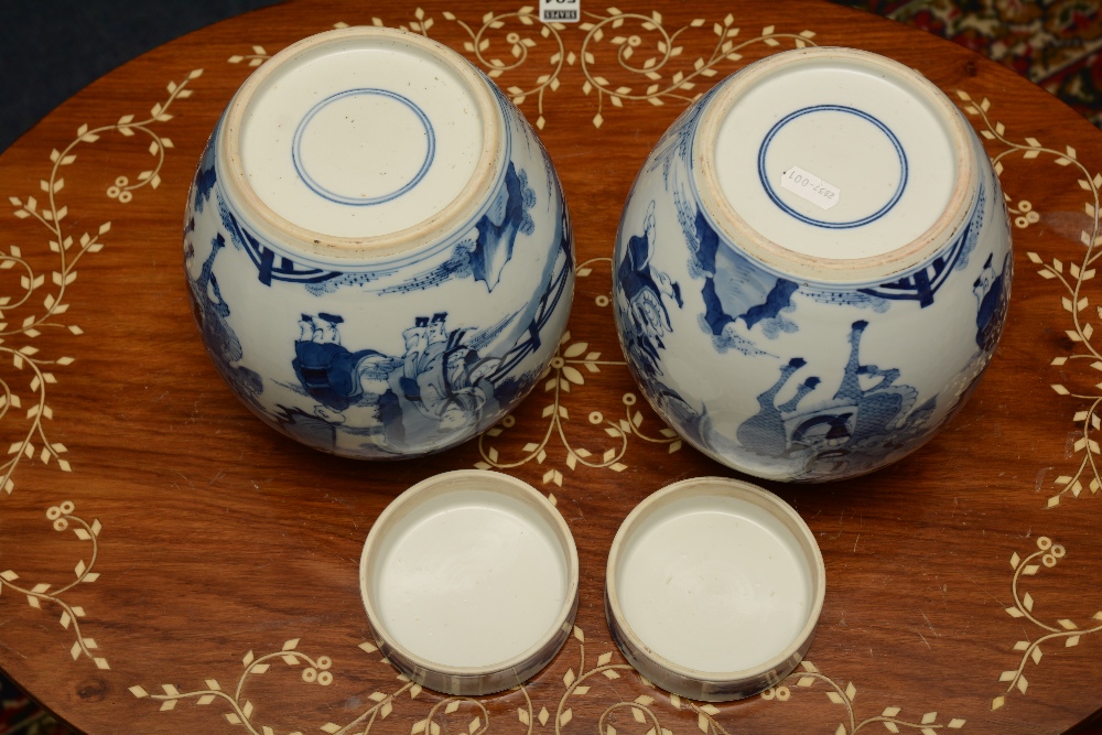 A pair of Chinese ginger jars and covers, with blue decorated figures in foliage, on white ground, - Image 5 of 5