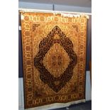 A Kum wall hanging/carpet, the central medallion with allover foliate design,