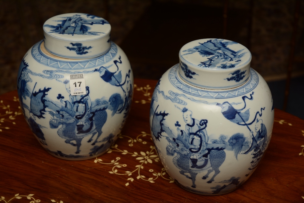 A pair of Chinese ginger jars and covers, with blue decorated figures in foliage, on white ground, - Image 2 of 5