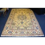 A fine Nain carpet, the central medallion with allover floral design ove cream ground with floral