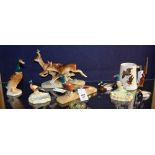 Six Beswick animal ornaments, in the form of pheasants and mallard ducks, various sizes,