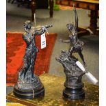 Two spelter figures, one in the form of a classical female holding torch with stag below,
