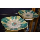 A pair of Chinese scallop shaped dishes, with green and white enamel decoration,