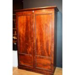 A 19th century mahogany wardrobe,
