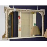 A Victorian painted giltwood overmantle mirror,