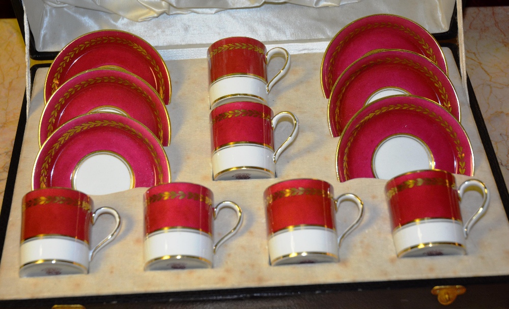 A Fenton coffee set in fitted box, comprising of six coffee cans and matching saucers,