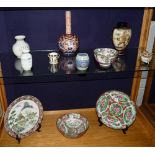 A quantity of Oriental porcelain, to include a Japanese Imari bottle shape vase, a satsuma vase,