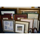 A quantity of framed prints,