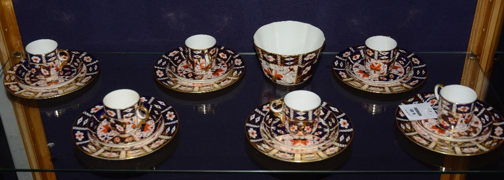 A quantity of Royal Crown Derby Imari pattern tea and coffee wares, comprising of six side plates,
