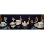 A quantity of decorative porcelain, to include bisque child figure, three Hummel figures,