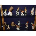 A quantity of Goebel porcelain bird figures, to include grouse, owl and robin red breast examples,