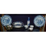 Two Chinese export porcelain blue and white plates, decorated with pagodas in landscape and foliage,