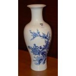 A Chinese porcelain vase, decorated with blue coloured birds in foliage on white ground, blue